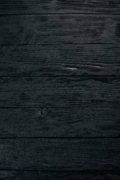 Old vintage wooden black background. Top view. Free space for your text. - Φωτογραφία, εικόνα