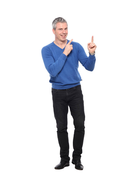 Adult caucasian man is pointing to something - Photo, Image