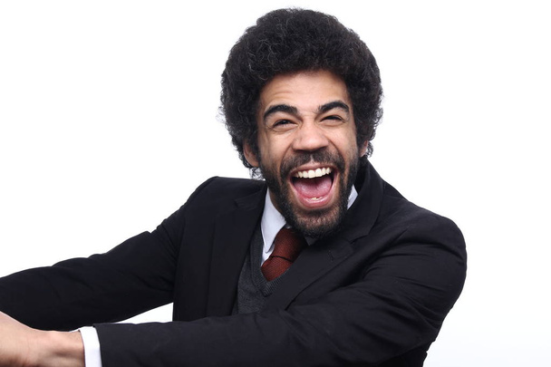 Emotional black businessman posing on white background - Photo, Image