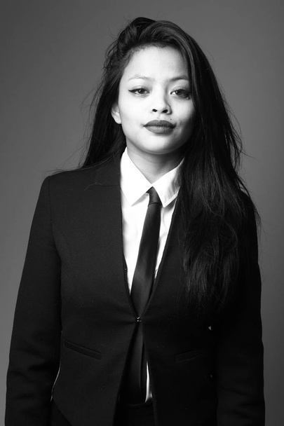 Serious asian woman on black and white tone - Foto, Bild
