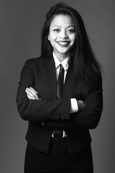 Smiling asian young woman on black and white tone - Fotoğraf, Görsel