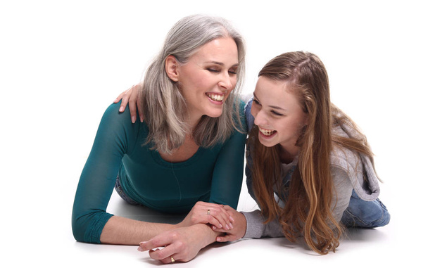 Happy mother and daughter is smiling - Fotografie, Obrázek