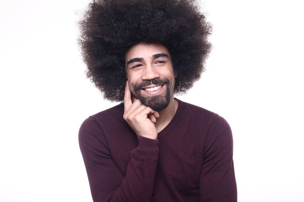 Afro-american man posing on white background - Фото, изображение