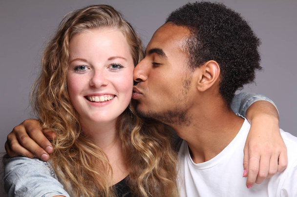 Beautiful happy loving interracial couple - 写真・画像