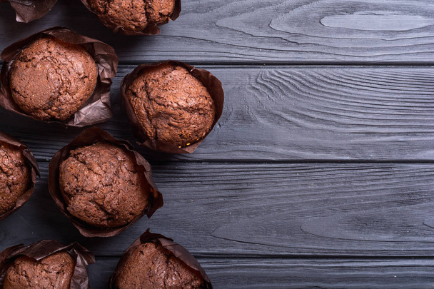 Sweet dessert chocolate muffins or cupcake . Food background - Zdjęcie, obraz