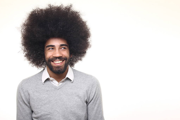 Happy  afro man in front of a white background - 写真・画像