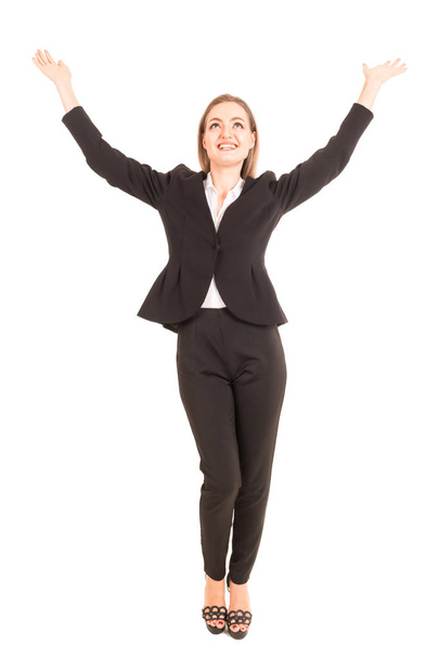 Başarılı iş kadını silah kadar izole üzerinde beyaz arka plan ile kutluyor - Fotoğraf, Görsel