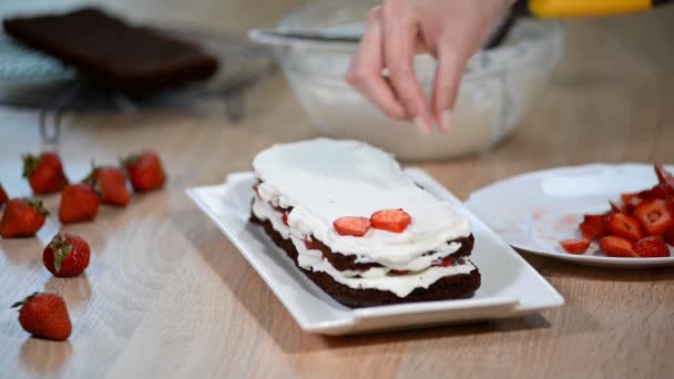 Female chef making chocolate cake with strawberries. - Footage, Video