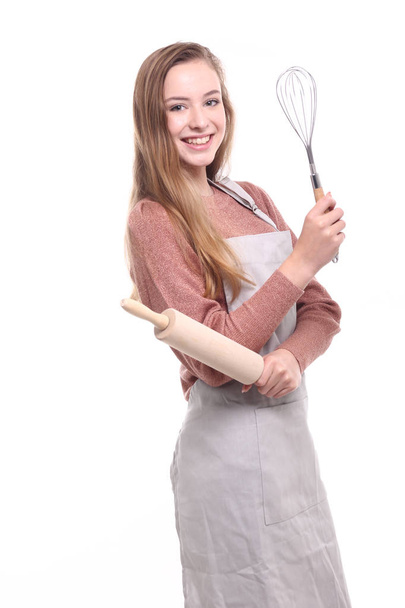 Beautiful caucasian girl with rolling pin and mixer - Foto, afbeelding