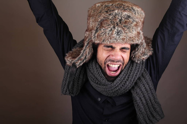 Screaming black man in winter clothes - Foto, immagini