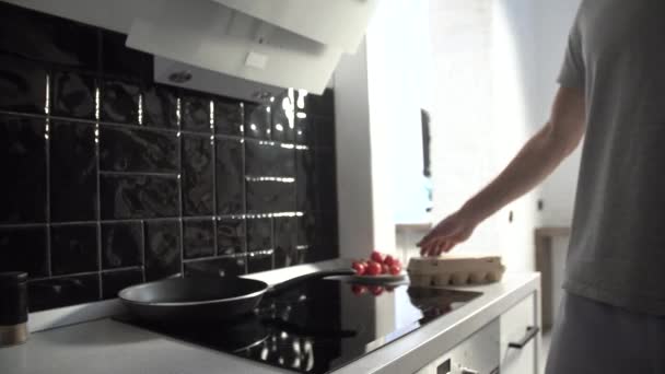 Kitchen. Man Pouring Oil On Frying Pan For Cooking  Breakfast - Felvétel, videó