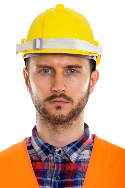 Young handsome bearded man construction worker - Foto, afbeelding