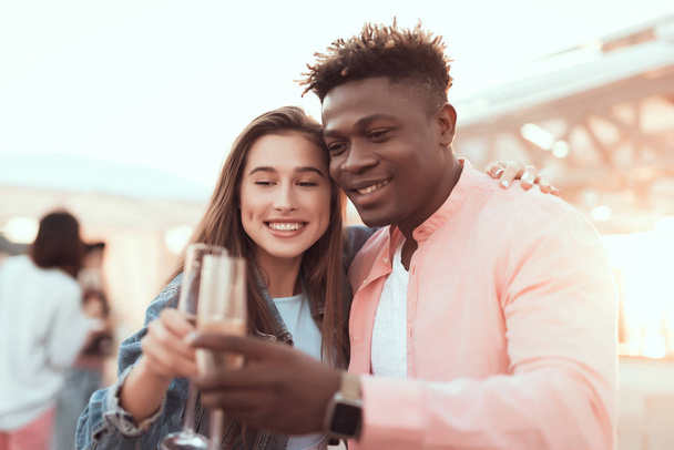Cheerful female and man tasting alcohol beverage - Foto, afbeelding
