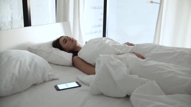 Alarm Clock On Phone. Woman Sleeping In Bed And Waking Up. Young Tired Female Closing Ears By Pillow And Cant Wake Up - Video, Çekim