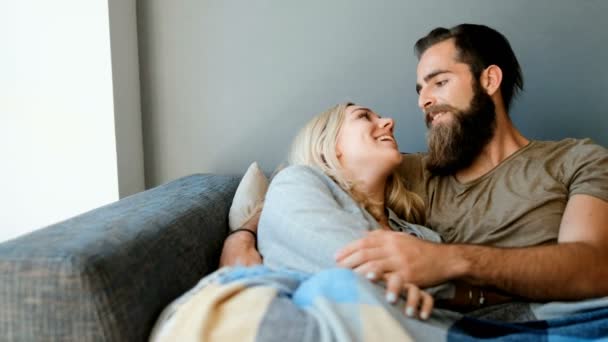 Couple romancing in living room at home 4k - Video, Çekim