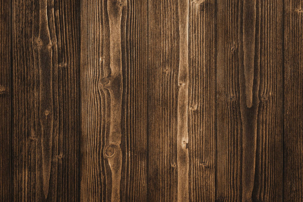 Текстура темно-коричневого дерева с естественным полосатым рисунком для фона, деревянная поверхность для добавления текста или оформления художественных работ
 - Фото, изображение