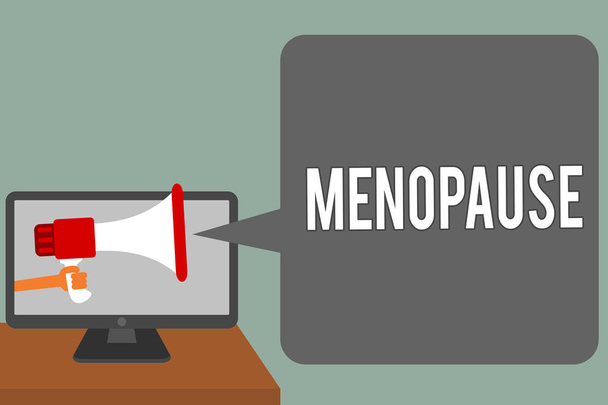 Uwaga: pisanie Wyświetlono menopauzy. Biznesowe zdjęcie prezentujący okres trwałego zaprzestania lub koniec cyklu miesiączki, człowiek posiada ekran komputera głośnik megafon mówi Dymek - Zdjęcie, obraz