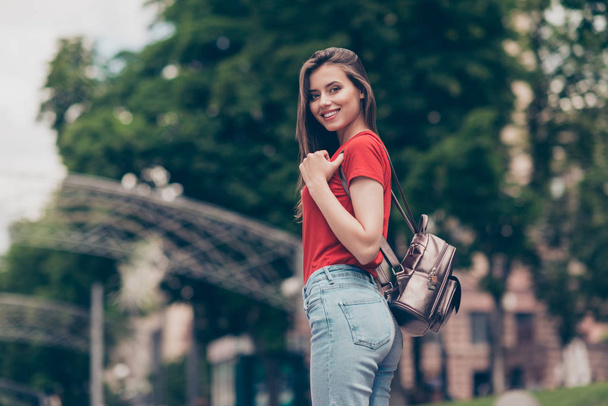 Nice charming attractive cute young smiling girl with bag bagpac - Foto, immagini