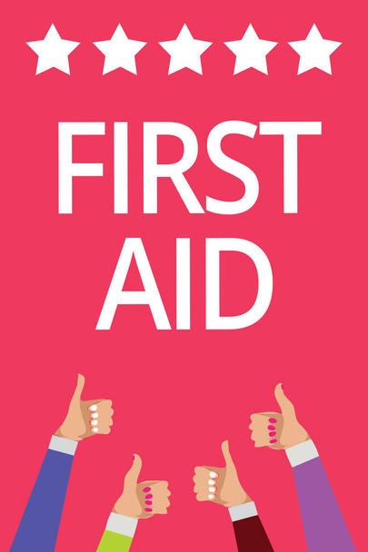 Word writing text First Aid. Business concept for Practise of healing small cuts that no need for medical training Men women hands thumbs up approval five stars information pink background - Photo, Image