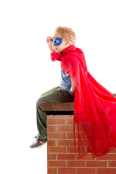 little boy pretending to be a superhero - Photo, image