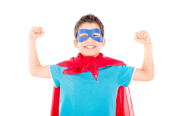 little boy pretending to be a superhero isolated on white background - Fotoğraf, Görsel