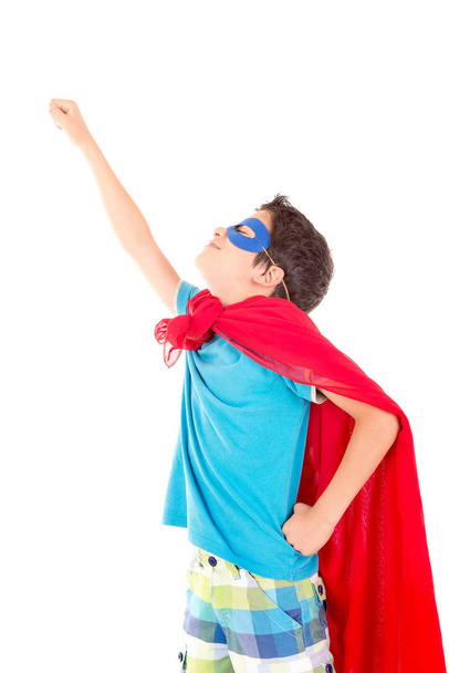 little boy pretending to be a superhero isolated on white background - Фото, зображення