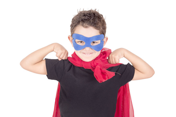 little boy pretending to be a super hero isolated on white - Фото, зображення