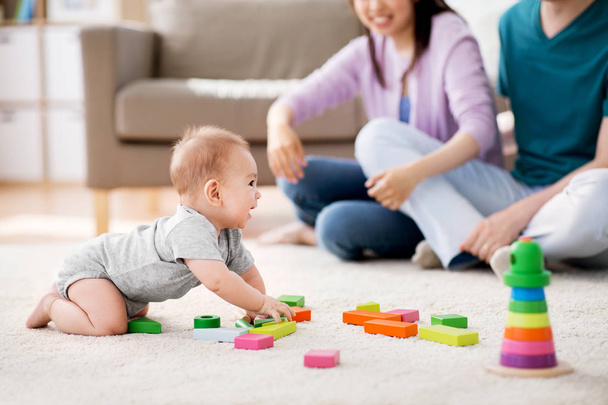 happy family with baby boy playing at home - Valokuva, kuva