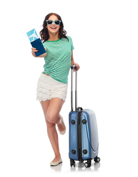 teenage girl with travel bag and air ticket - Foto, Imagen