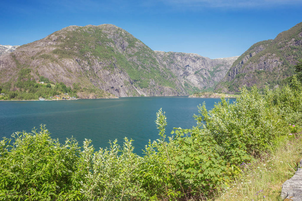 View over the Akrafjorden from the spot where the Langfossen flows into the fjord - Foto, Imagen
