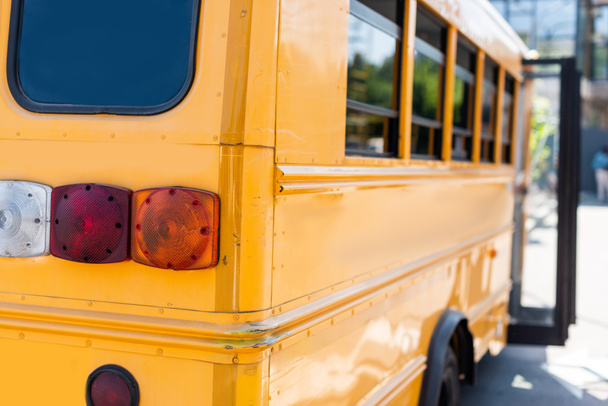 partial view of back lights of school bus - Фото, изображение