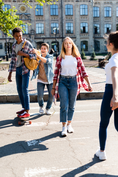 group of teenagers having fun together after school - Foto, imagen
