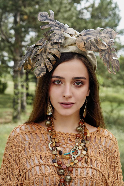 beautiful young fashion portrait of young woman in boho style clothing posing outdoors  - Φωτογραφία, εικόνα