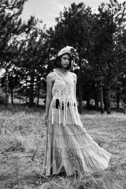 beautiful young fashion portrait of young woman in boho style clothing posing outdoors  - Fotografie, Obrázek