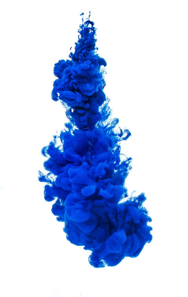 A drop of blue paint dissolved in water. - Fotografie, Obrázek