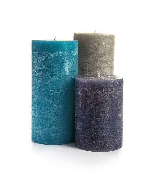 Different decorative wax candles on white background - Fotó, kép