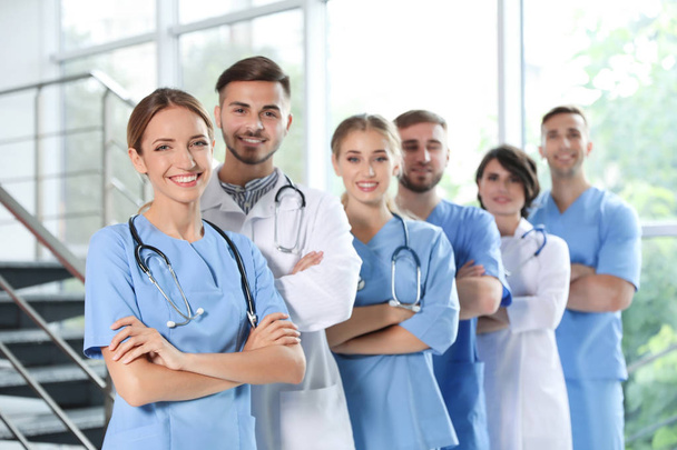 Team of doctors in uniform at workplace - Foto, immagini