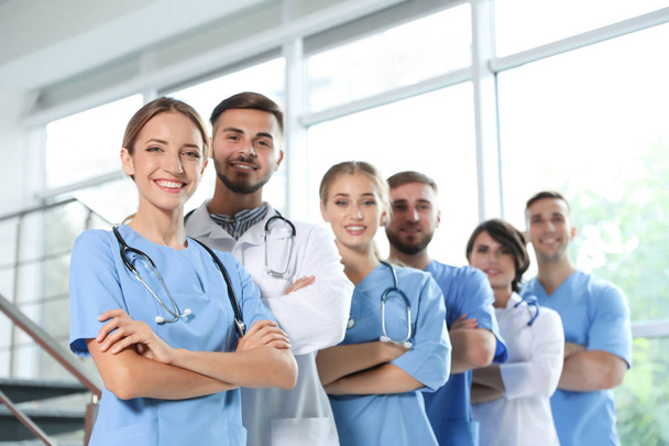 Team of doctors in uniform at workplace - Photo, Image