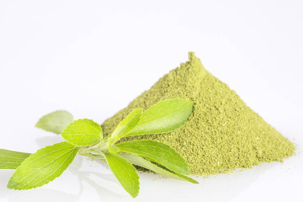 Natural sweetener in powder from stevia plant - Stevia rebaudiana - Zdjęcie, obraz