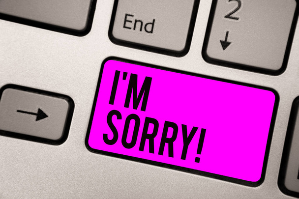 Text sign showing I am Sorry. Conceptual photo To ask for forgiveness to someone you unintensionaly hurt Keyboard purple key Intention create computer computing reflection document - Photo, Image