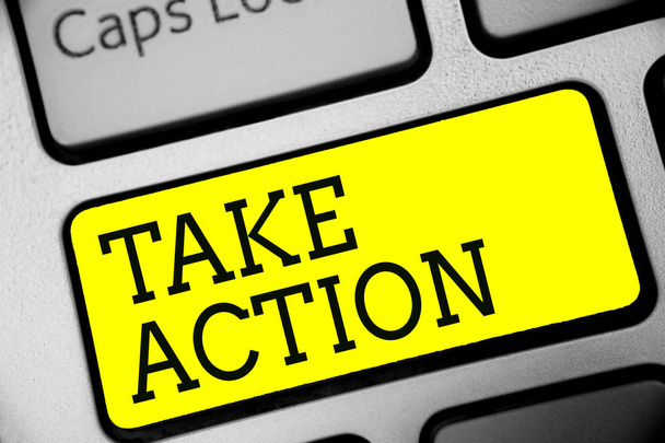 Text sign showing Take Action. Conceptual photo advices someone to do something or reaction right now Keyboard yellow key Intention create computer computing reflection document - Photo, Image