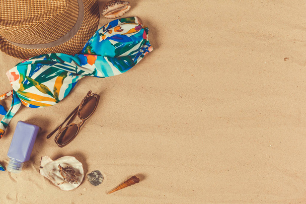 Holiday accessories on sand beach  - Foto, Imagem