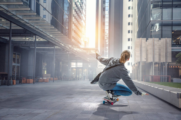 Teenager girl ride her skateboard. Mixed media - Valokuva, kuva