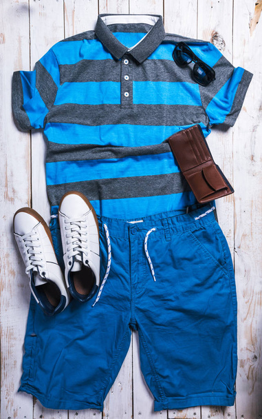 cool fashion casual men outfit on wooden table - Foto, imagen