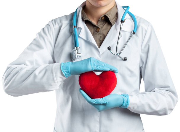 Female cardiologist in uniform holding red heart isolated on the white background - Φωτογραφία, εικόνα