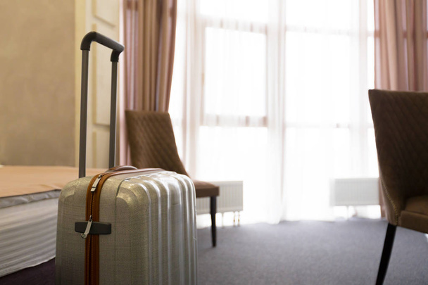 Suitcase or luggage bag in a modern hotel room - Foto, Bild