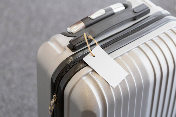 Close up of blank  luggage tag label on a suitcase  - Foto, Imagem