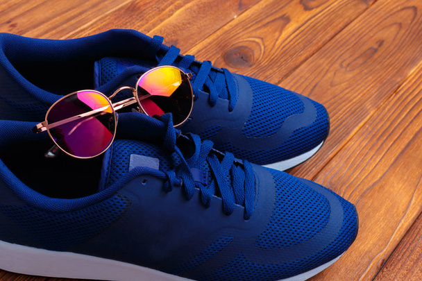Blue sportive sneakers close up, fitness concept - 写真・画像