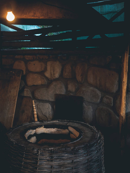 preparation of traditional georgian flatbreads in stove - Foto, Bild