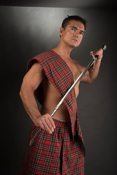 The sexy highlander poses for the camera. - Photo, Image